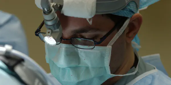 A Surgeon In The Middle Of A Operation